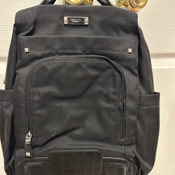 Tumi Handbags - Tumi Navagation backpack. Black, great condition.